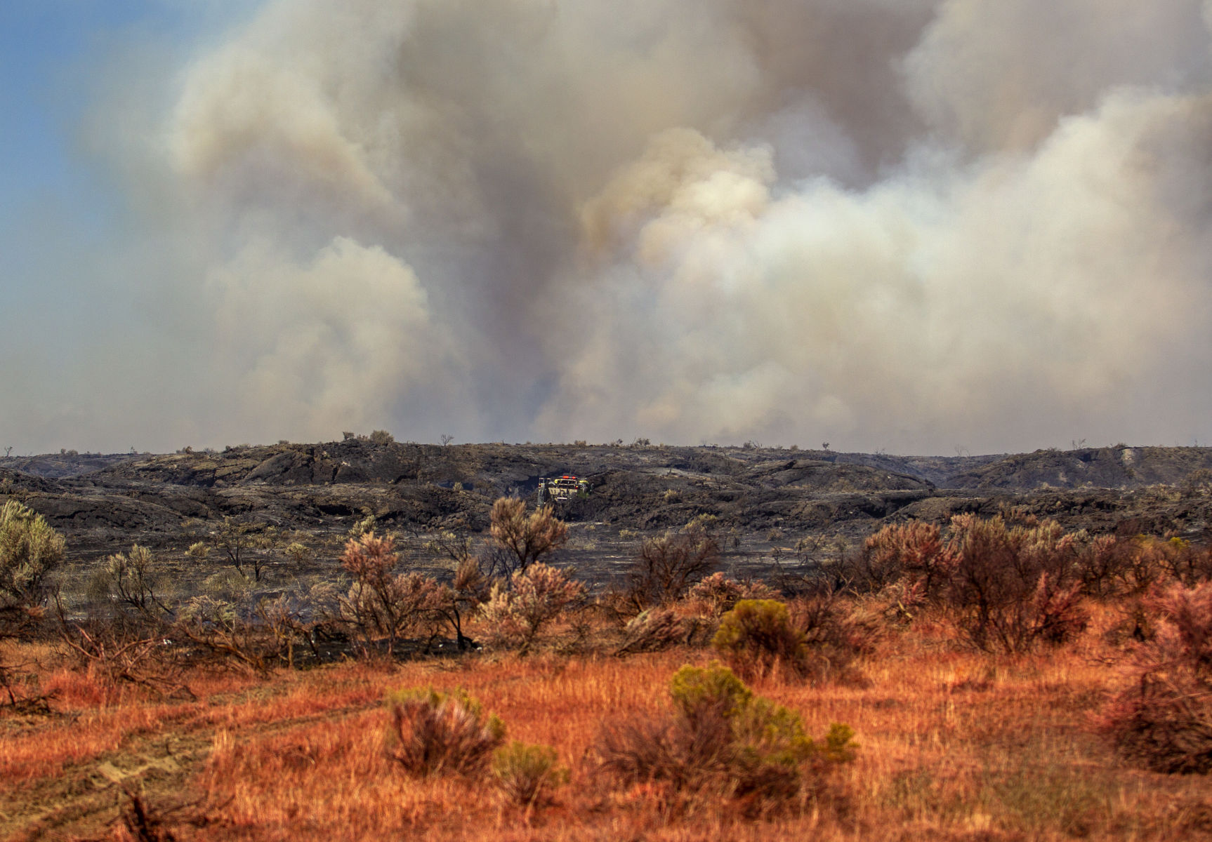 Drops Fire spreads more than 2,000 acres